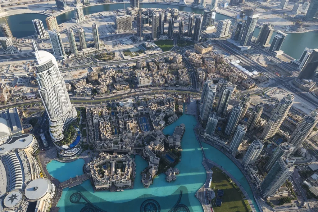 Buyer reviewing escrow and construction documents for a Dubai development