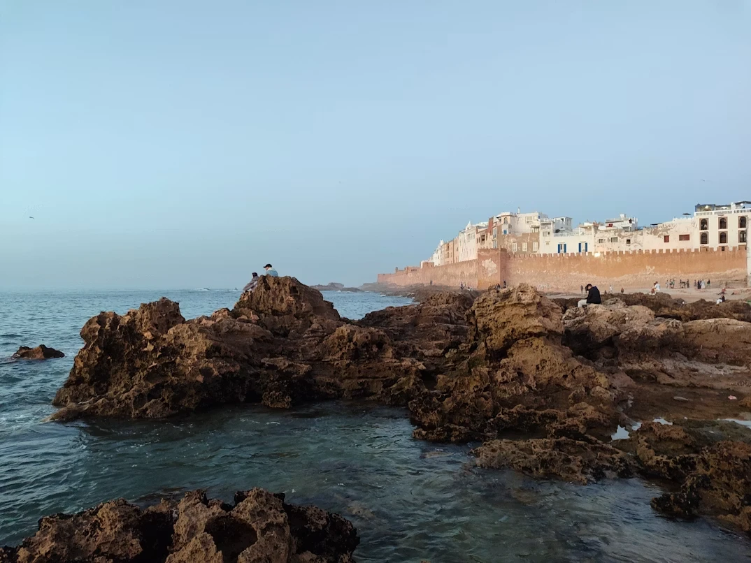Investing in Morocco illustrated by a modern business district and financial skyline