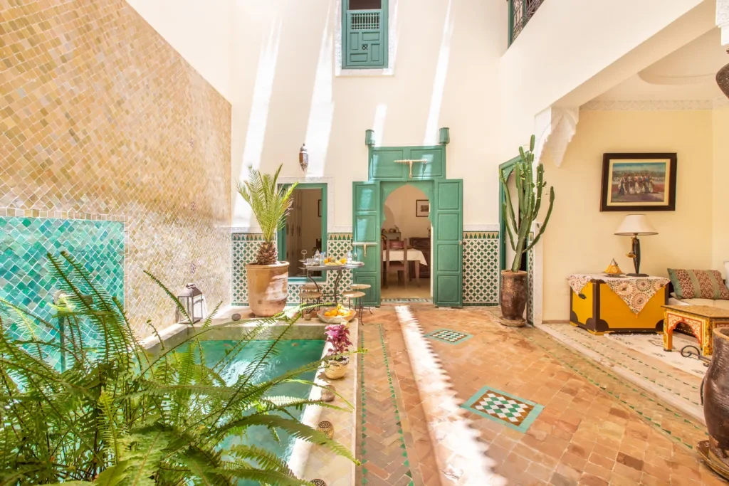 A prepared Marrakech holiday villa with a maintained pool and garden