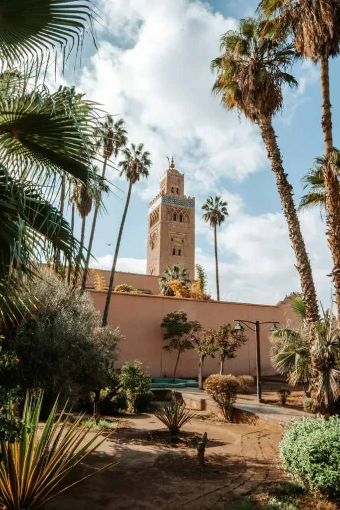 Historic Marrakech ramparts and minaret in warm evening light