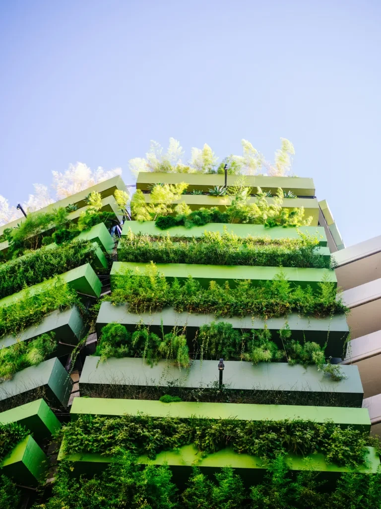 A maintained vertical growing system integrated into a residential building