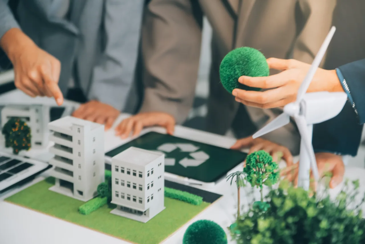 Sustainable real estate investment concept with eco-friendly buildings and renewable energy models