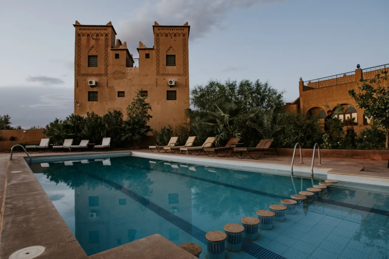 Traditional Moroccan house with pool showcasing Douar property investment Marrakech.