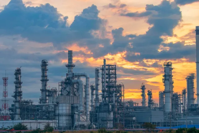 Industrial zones near resorts in Morocco during sunset, showing balance between industry and tourism.